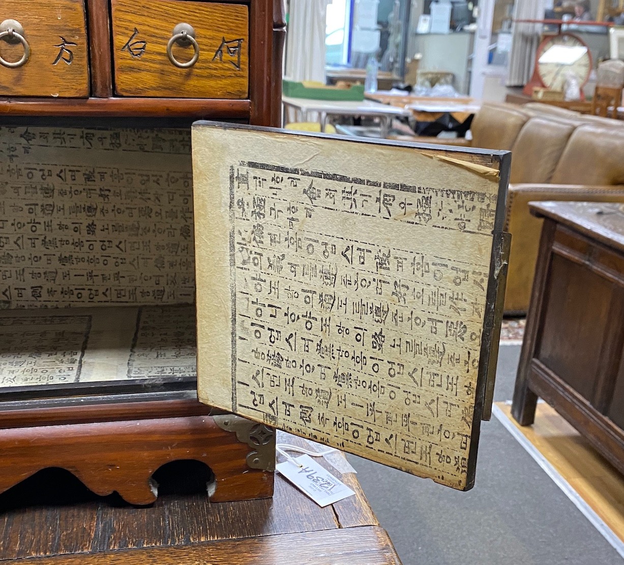 A Chinese elm medicine cabinet, width 65cm, depth 25cm, height 64cm